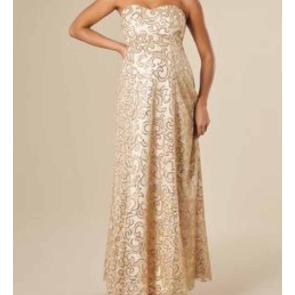 Champagne/gold Olivia gown by Tiffany Rose